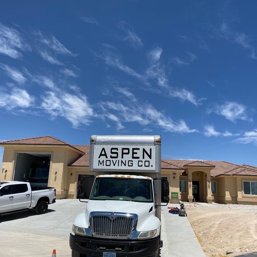 Aspen Moving Company truck parked outside a Nevada home on moving day